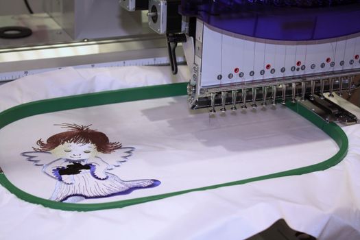 Beautiful picture which is embroidered by means of the electric machine