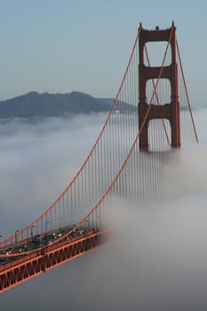 The iconic Golden Gate Bridge in San Francisco, California. Viewed from the Marin Headlands with the city of San Francisco in the background.