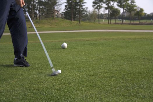 Driver making contact with golf ball