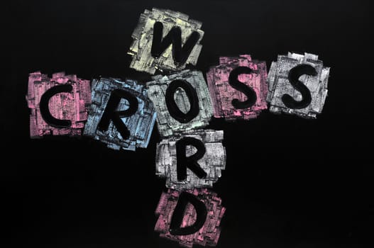 Crossword drawn with colorful chalk on a blackboard