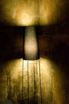 abstract: retro light and grungy concrete background, greenish look
