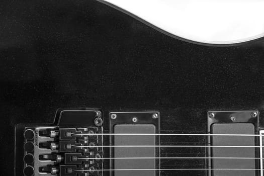 Electric guitar detail shots over white backdrop