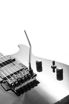 Electric guitar detail shots over white backdrop