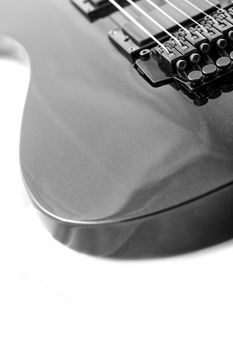 Electric guitar detail shots over white backdrop