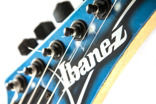 Electric guitar detail shots over white backdrop