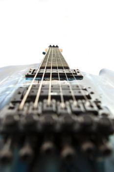 Electric guitar detail shots over white backdrop