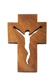 Modern wooden crucifix over a white backdrop