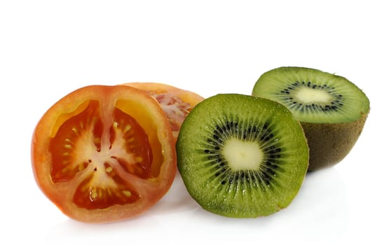 sliced red tomato and green kiwi fresh fruit