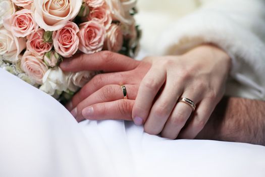 The groom keep the bride for hands