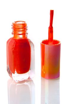 orange nailpolish on a white background