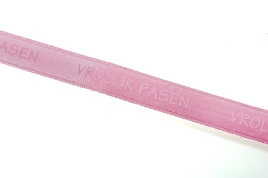 a ribbon with the text "vrolijk pasen"