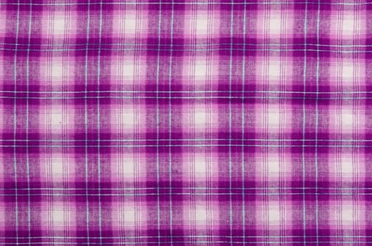 Purple cloth, checkered background.