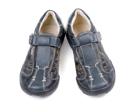 Pair of leather baby shoes. Isolate on white