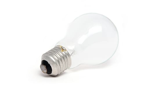 Light bulb on a white surface