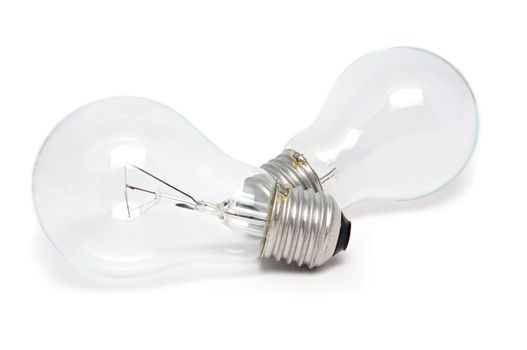 Two light bulb on a white surface