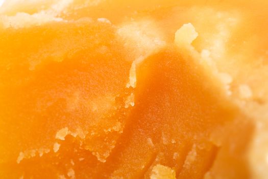 fresh yellow candied honey closeup