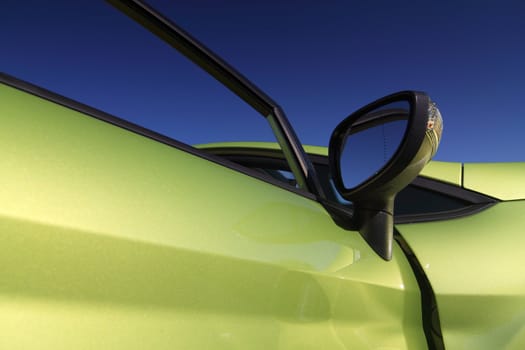 picture of a detail cute and sporty green car