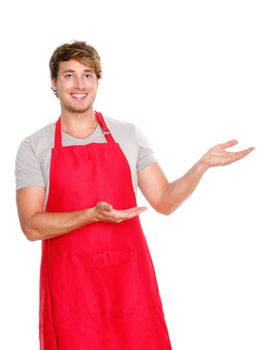 Small business shop owner showing wearing red apron. Happy smiling caucasian man presenting isolated on white background.