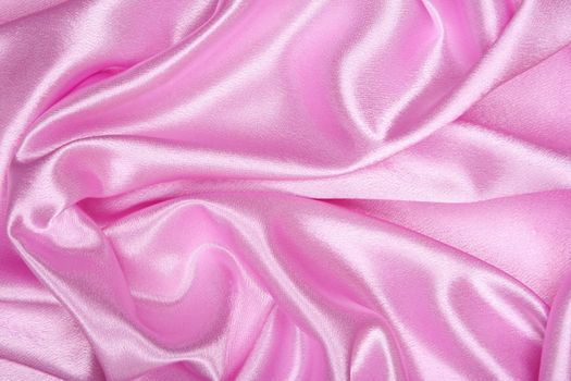 Smooth elegant pink silk as background 