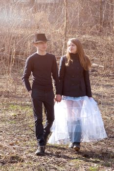 Young couple walking in the park