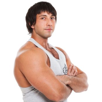 Attractive muscular guy in fitness wear isolated on a white background