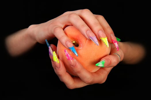 Human fingers with long fingernail and beautiful manicure isolated on black