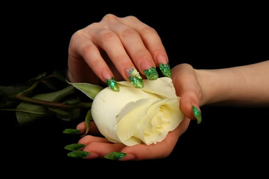 Human fingers with long fingernail and beautiful manicure isolated on black