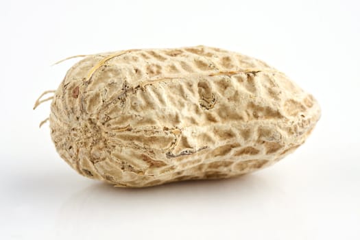 Closeup of a peanut with white background.