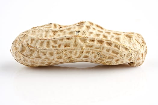 Closeup of a peanut with white background.