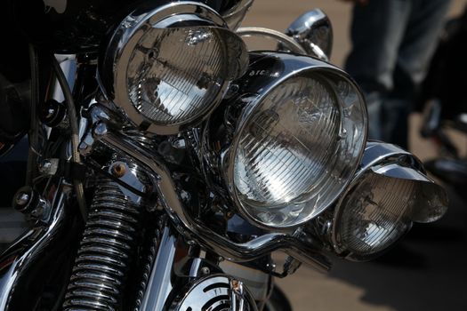 Motorcycle headlights close-up background