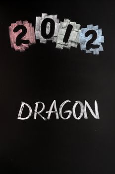 2012, the year of dragon drawn with chalk on blackboard