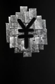 Symbol of Chinese Yuan drawn with chalk on blackboard