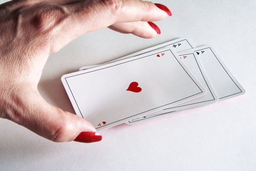 close up of playing cards poker game on white background