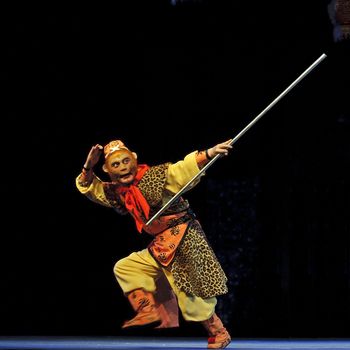 Chinese traditional opera actor performs on stage.