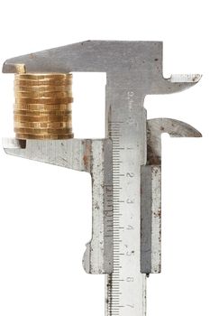 Stacks of coins measured with a caliper. Concept image of management