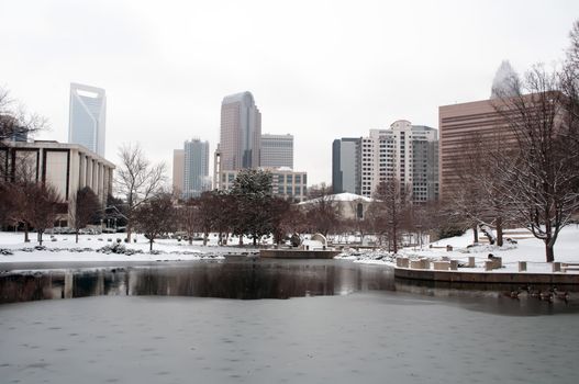 modern city in winter - Charlotte skyline in snow