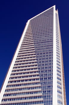 modern glass and concrete structure of skyscraper