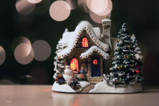 Christmas decoration (small house, covered by snow)