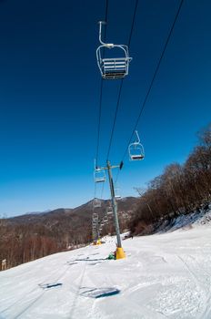 views from a ski lift during vacation on sunny day