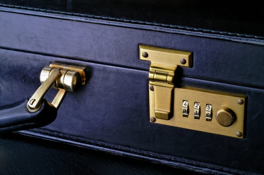 Briefcase detail closeup showing combination lock (2)