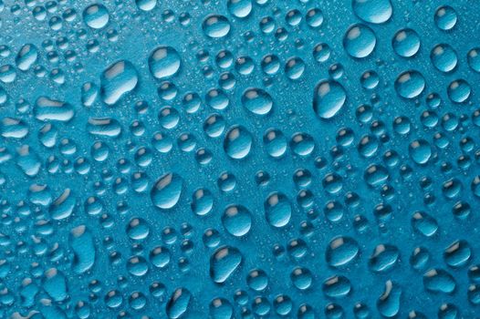 Droplets on blue background