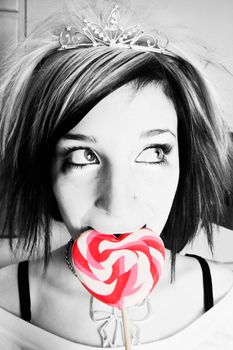 Black and White Alternative Girl in a Kitchen with a Red and White Heart Lollipop