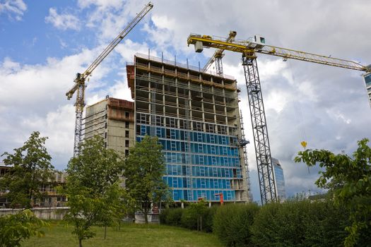 construction of office buildings, cranes