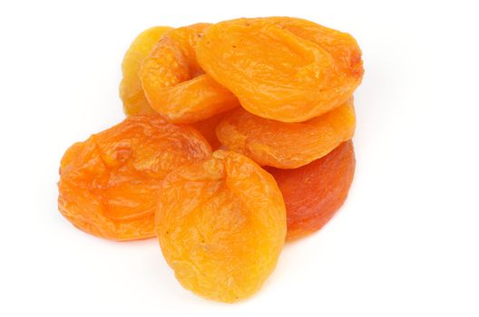 Heap of Perfect Dried Apricots isolated on white background