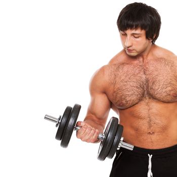 Muscular guy exercises with dumbbell on a white background