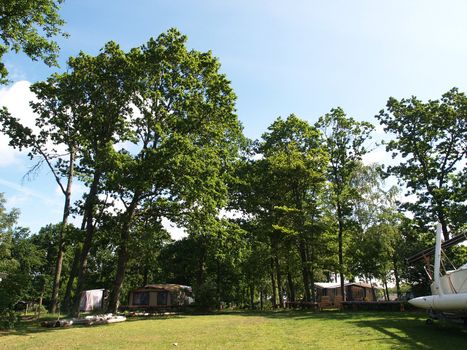 Caravans campers camping in a campground site out in nature