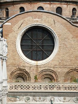 Beautiful window in the side part of the Basilica St Mark's in Venice 