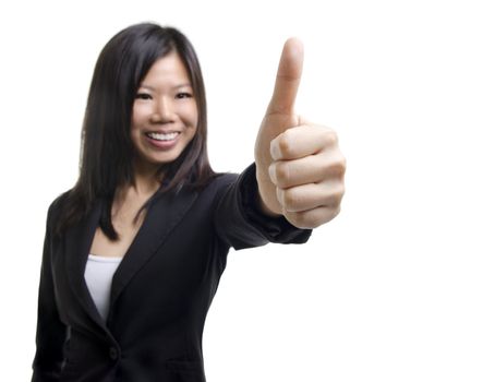 An Asian girl giving thumb up sign on white background