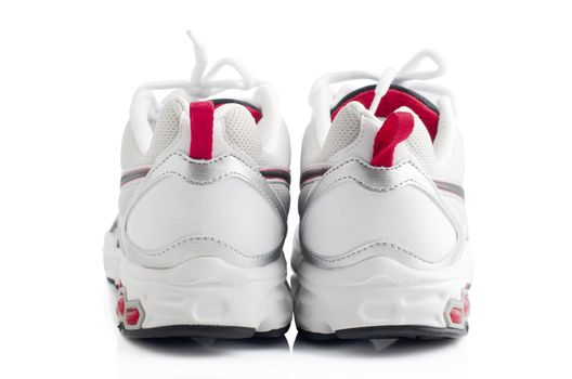 Pair of sport shoes on white background