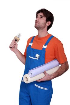 handyman going to stick roll papers